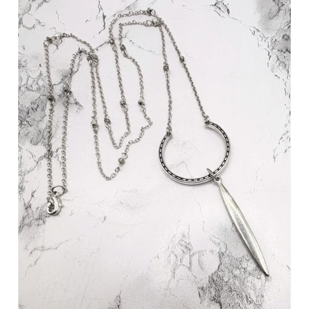 Source Unknown long silver
